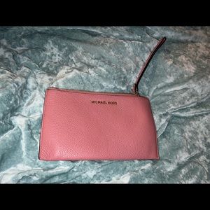 Medium wristlet. Light pink color.